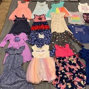 Girls size 7 and 7/8 assorted dresses, shirts, shorts, jeans, pajamas Like New
